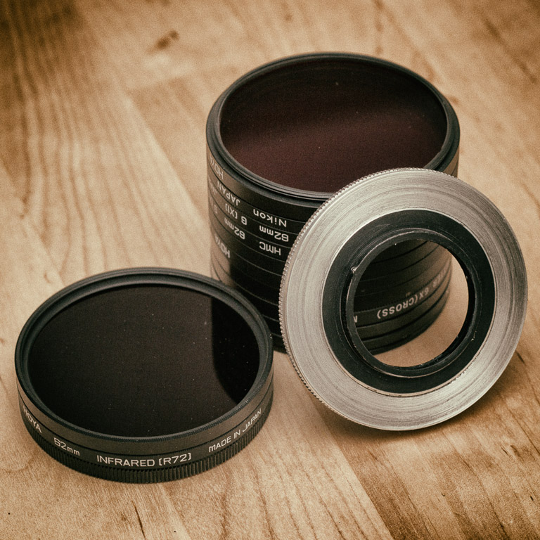 A stack of 62mm filters with a Flexaret Filter Adapter.